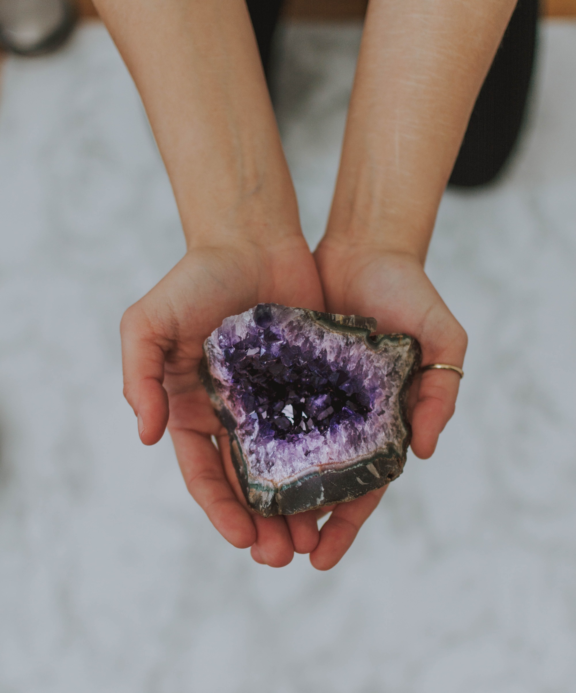 Amethyst held in hands